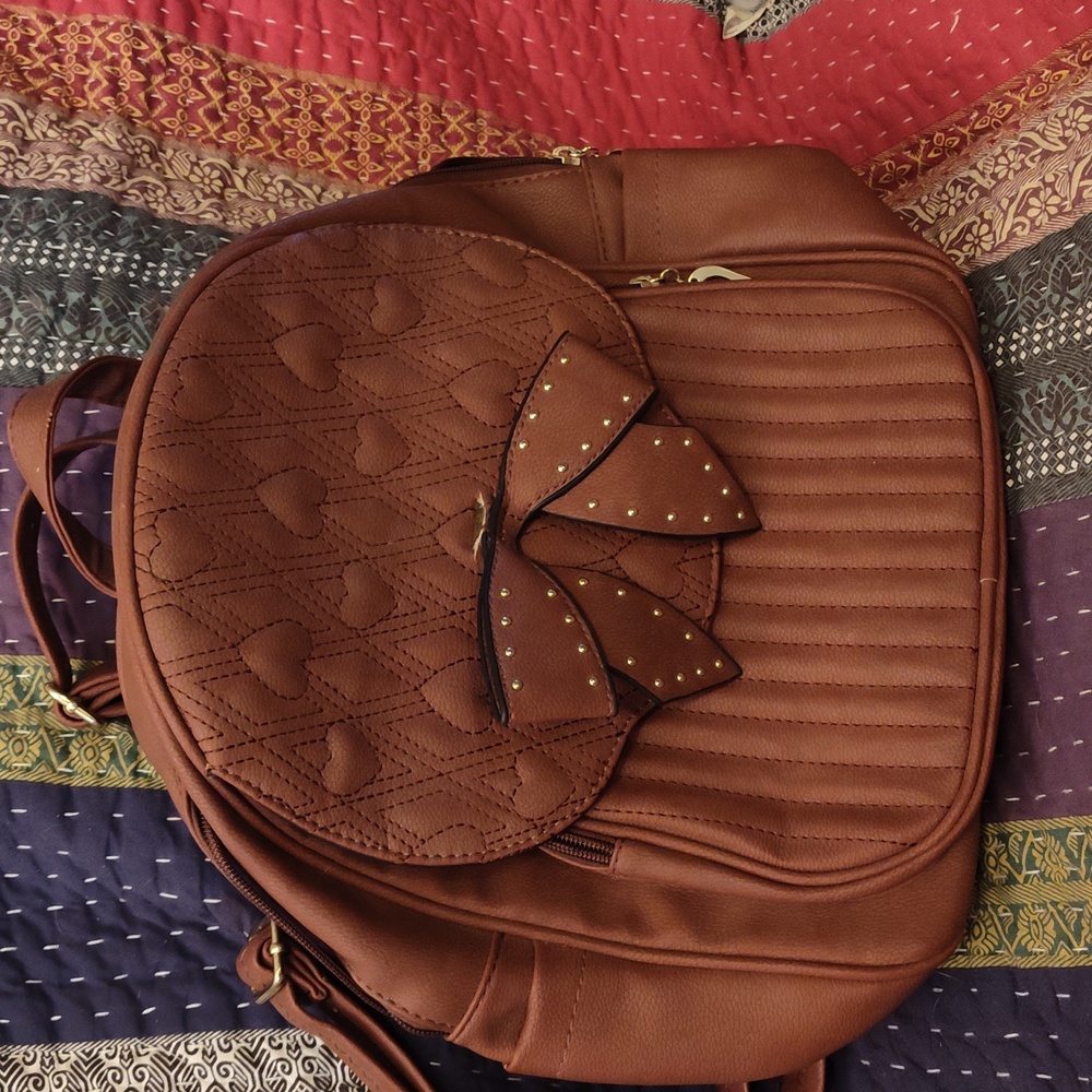 WT2- Brown Quilted Backpack with Bow Accent